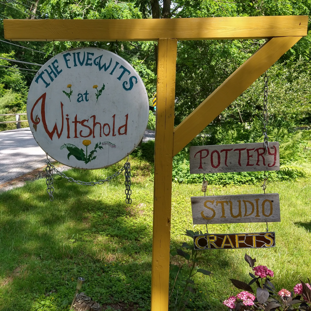 the Witshold's front sign, as seen from the road